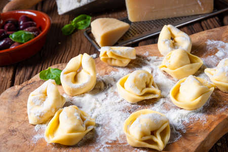 Delicious tortellini di formaggio with cheese and pepper fillingの写真素材
