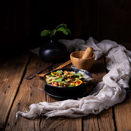Pasta salad with green asparagus, olives and parma hamの写真素材
