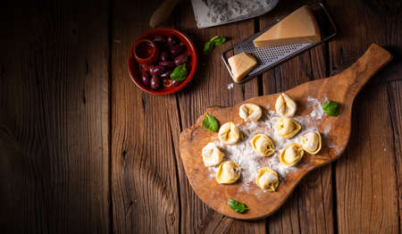 Delicious tortellini di formaggio with cheese and pepper fillingの写真素材