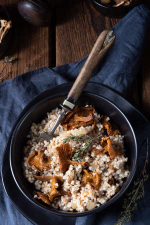 Kaszotto- polish risotto from barley groats with mushroomsの写真素材