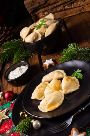 Polish Christmas pierogi with sauerkraut and mushroomsの写真素材