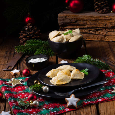 Polish Christmas pierogi with sauerkraut and mushroomsの写真素材