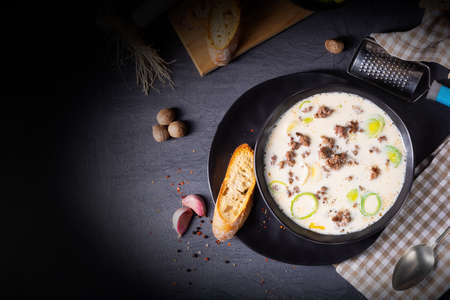 Delicious cheese and leek soup with minced meatの写真素材