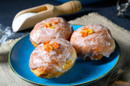 Fine Berlin donuts with jam filling and icingの写真素材