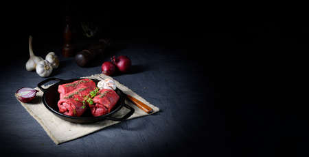 raw beef roulades prepared for cookingの写真素材