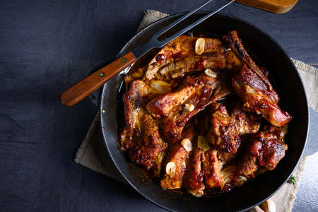 Spicy pork ribs with garlic and barbecue sauceの写真素材