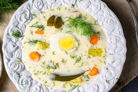 Dill soup with egg and fresh dillの写真素材