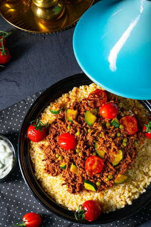 Tomato bulgur with vegetables and minced meatの写真素材