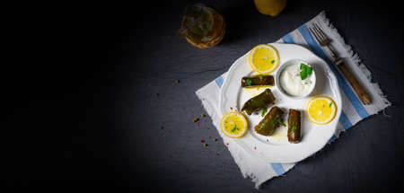Dolmades - stuffed grape leaves the Greek way