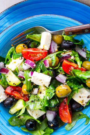 Rustic Greek salad with sheep's cheeseの写真素材