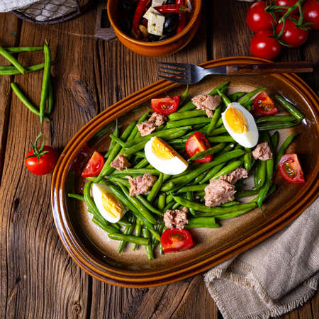 Rustic green bean salad with egg and tunaの写真素材