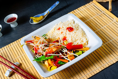 fried sweet and sour chicken with vegetablesの写真素材