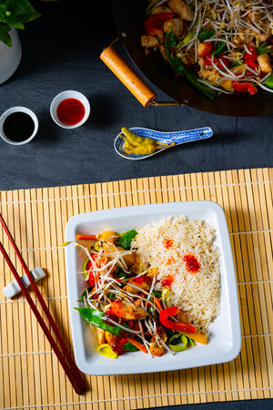 fried sweet and sour chicken with vegetablesの写真素材