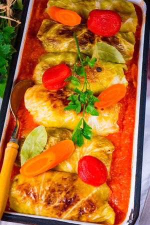 Polish cabbage rolls with tomato sauceの写真素材