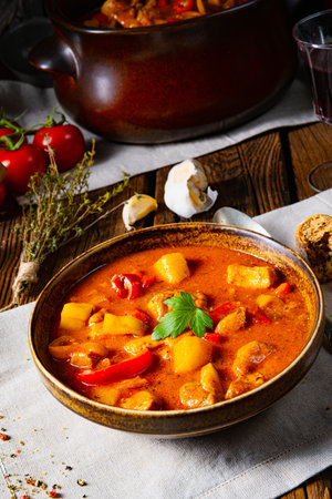 rustic Hungarian goulash soup with paprikaの写真素材