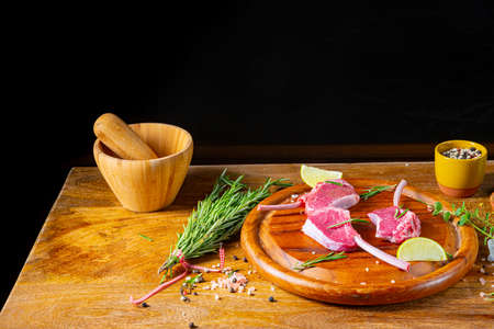 Raw Fresh Lamb Chops Wooden Cutting Boardの写真素材