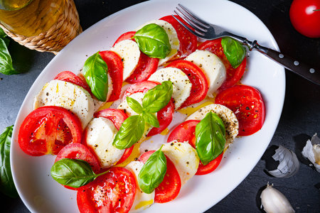 Tomato with mozzarella and basilの写真素材