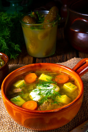 Polish sour cucumber soup with dillの写真素材