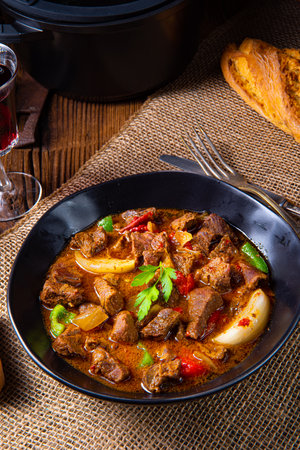 classic beef goulash with peppers and onionsの写真素材