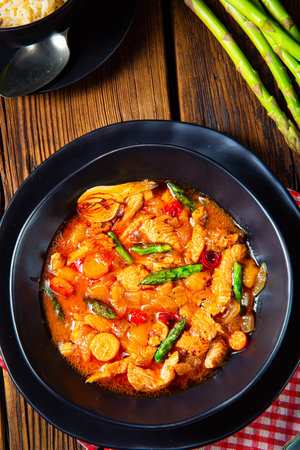 colorful turkey fricassee with asparagus and paprikaの写真素材
