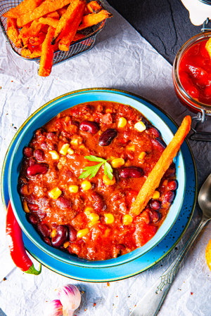 chili con carne with sweet potato and spicy nachosの写真素材