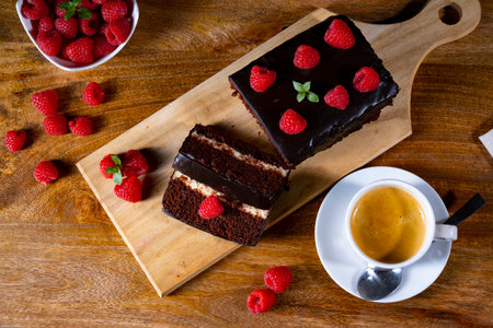 Chocolate cake with raspberries and coffeeの写真素材