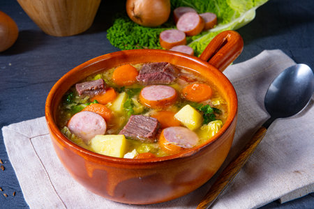Delicious savoy cabbage stew in a rustic bowlの写真素材
