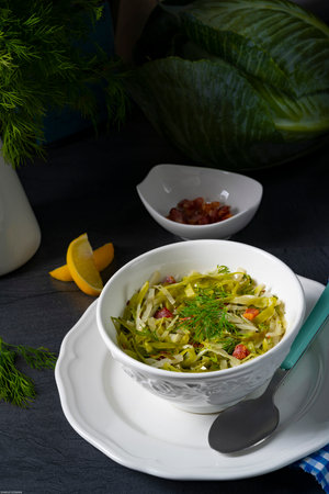 White cabbage with dill and diced baconの写真素材