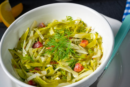 White cabbage with dill and diced baconの写真素材