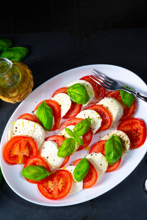 Tomato with mozzarella and basilの写真素材