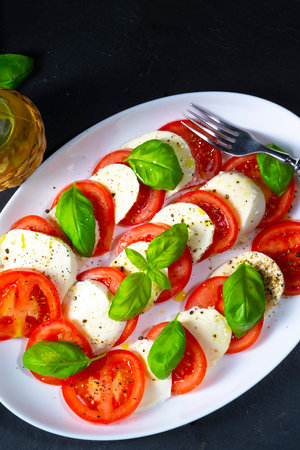 Tomato with mozzarella and basilの写真素材