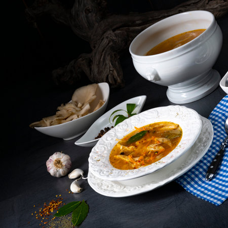 Traditional turkish soup khinkali with meat and vegetables on dark backgroundの写真素材