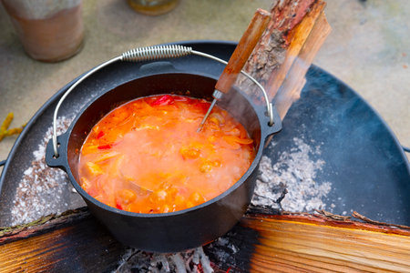 Kettle goulash is prepared over an open fire!の写真素材
