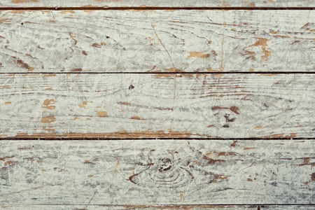 Abstract background of shabby textured surface of wooden panels in weathered blue paint.の写真素材