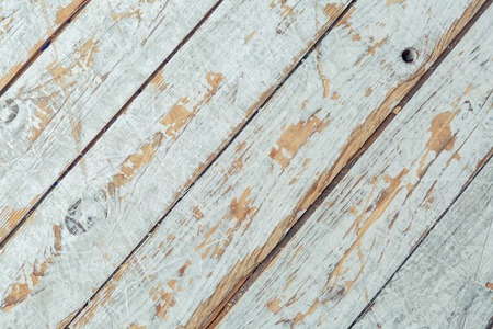 Abstract background of shabby textured surface of wooden panels in weathered blue paint. の写真素材