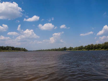 Deep lake under summer blue sky, natural background