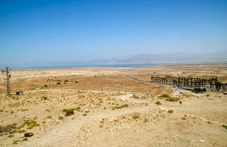 Israel desert landscape with palm trees oasis and Judean mountains at the background.の写真素材
