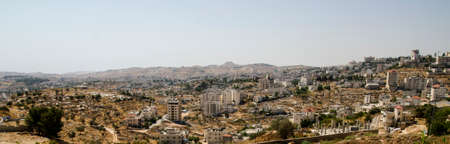 Panorama of Bethlehem with Herodium Herodion hill at the background. Landmarks for tourists of...