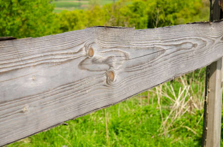 Wooden fence in the village. Private property borderlineの写真素材