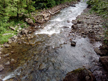 Mountain river and green grass, natural background