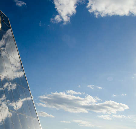 Glass wall of a business center modern background, urban architecture template