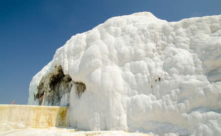 Pamukkale limestone walls and hills background, Turkey. Snow white hills of a natural wonderのeditorial素材
