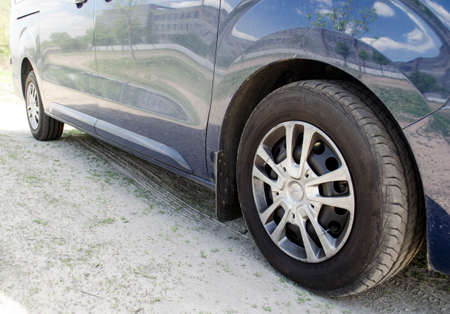 Car wheels close view, dirty natural wheelÑ photoの写真素材