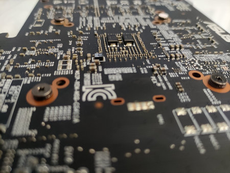 Computer engineering microchip blurred background. Microelectronic high tech wallpaper. Motherboard hardware, electronics conceptual photographyの写真素材