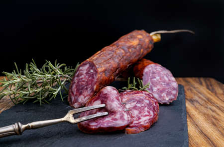 Tasty sausages and vegetables isolated over solid background, food photography for restaurants and...