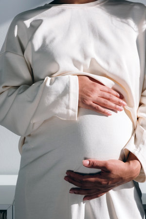 Pregnant woman close view. Pregnancy background