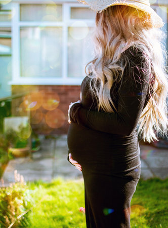 Pregnant woman close view. Pregnancy background