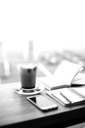 Coffee cup close vew black and white photo background, cup of tea or coffee on the tableの写真素材