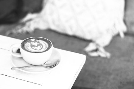 Coffee cup close vew black and white photo background, cup of tea or coffee on the tableの写真素材