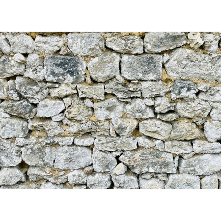 Stone wall isolated on white background. Old stone wall texture background.の写真素材